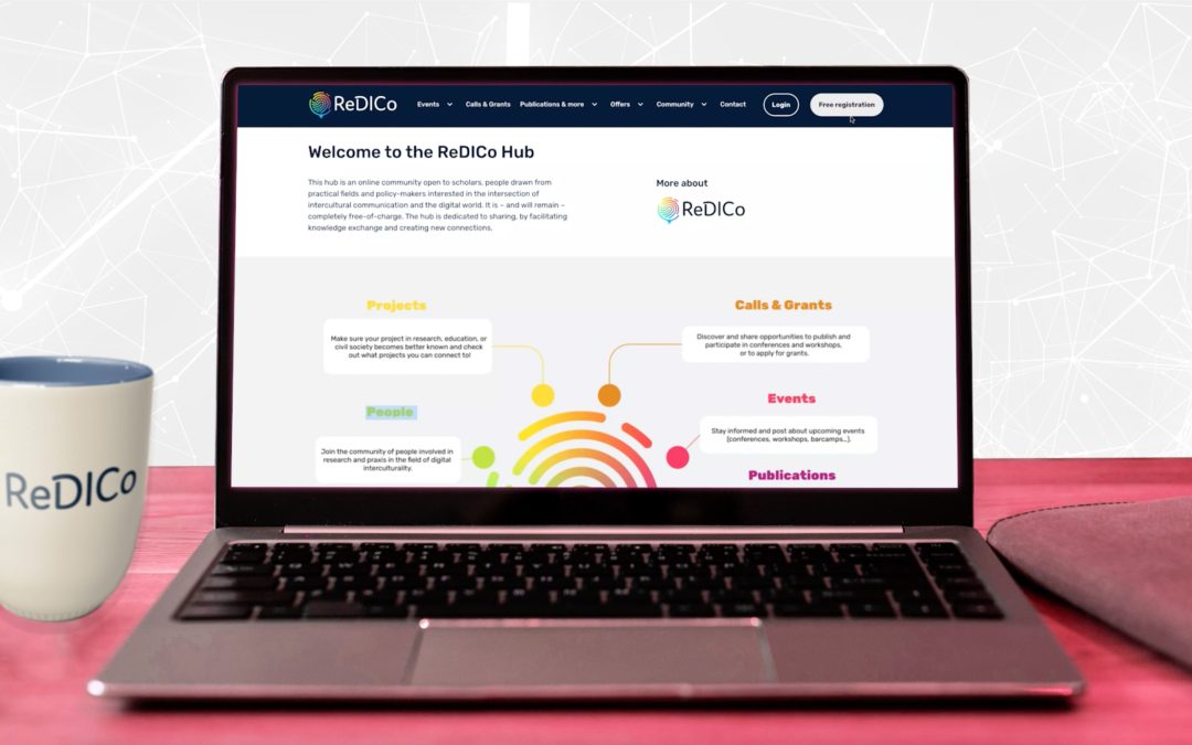 A laptop with "Welcome to the ReDICO Hub" written on the screen.